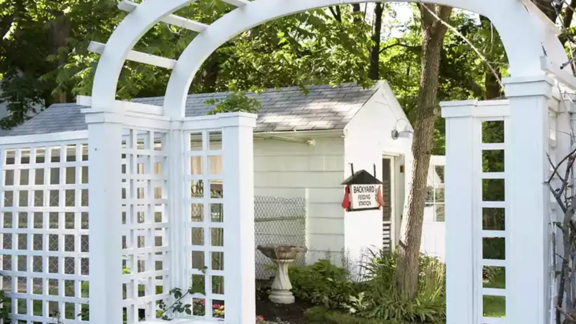 25 Beautiful Pergola Ideas to Add Style, Shade & Comfort to Your Backyard 24 Include an Arched Arbor for a Whimsical Garden Entry