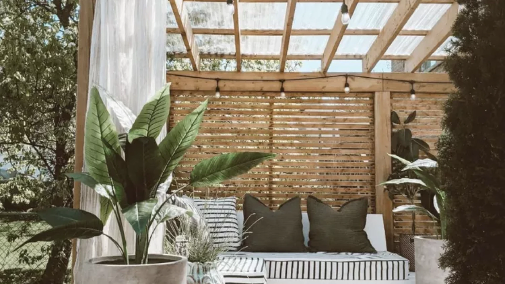 25 Beautiful Pergola Ideas to Add Style, Shade & Comfort to Your Backyard 3 Light Wood Pergola with Curtains for Privacy and Natural Warmth