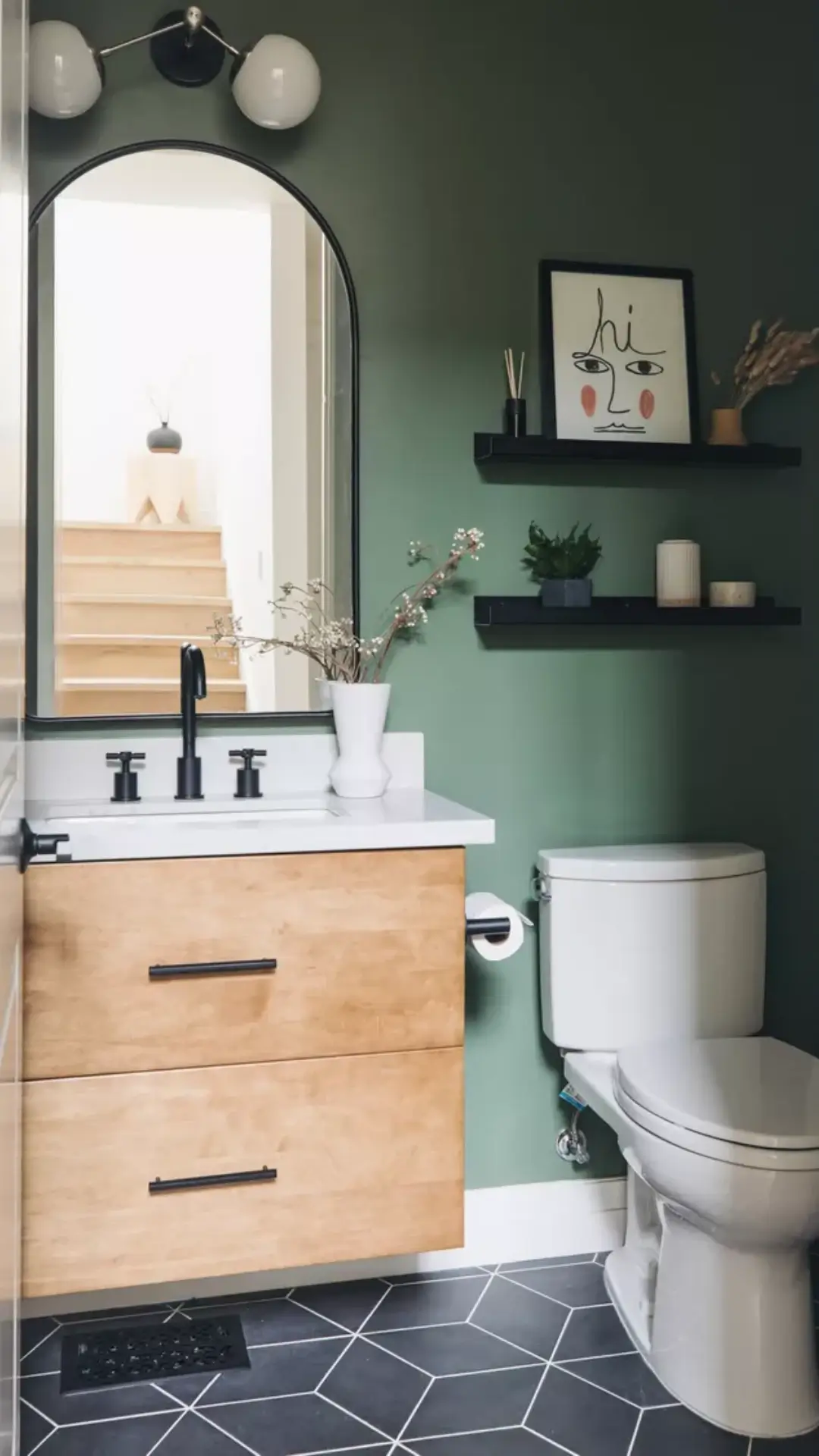 How can vertical storage maximize space in a small bathroom?